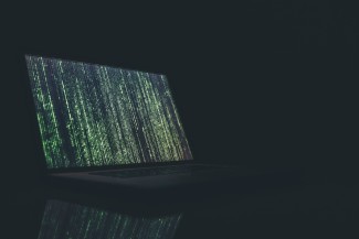 computer with fuzz on screen